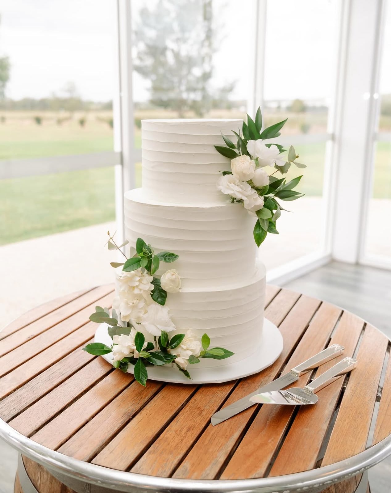 3 tier wedding cake with rippled white icing / Set up in Peterson House Hunter Valley
